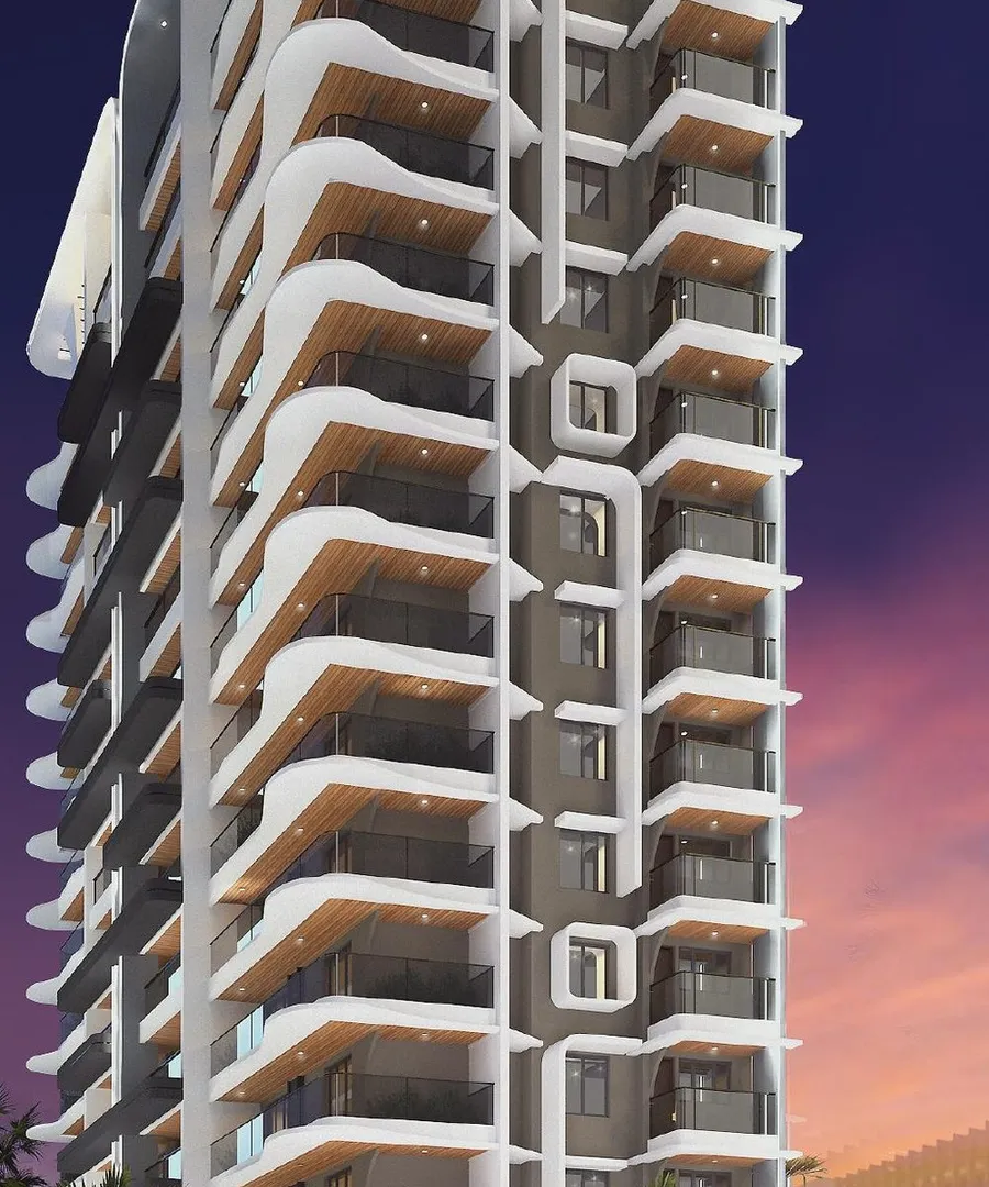 Lotus Gowri Shankar tower rising above Urwa, Mangaluru at twilight